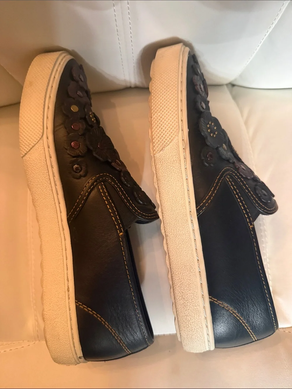 Coach Black Leather Slip-On Loafers with Floral Appliqués